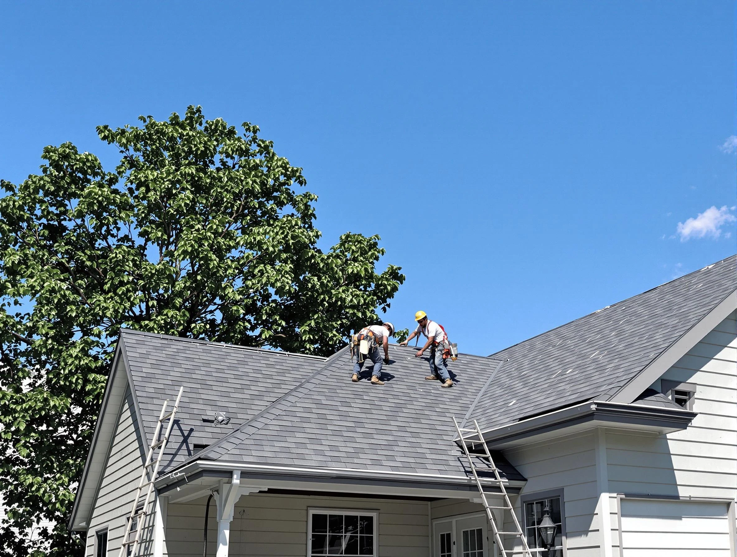 Stow Roofing Company crew finalizing a roof installation in Stow, OH